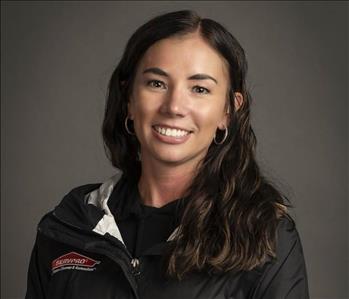 female servpro employee in front of blank background